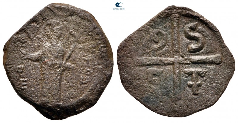 Tancred AD 1101-1103. Antioch
Follis Æ

22 mm, 2,96 g

Nimbate St. Peter st...
