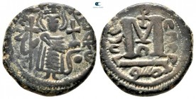 Arab-Byzantine. Dimashq (Damascus). Standing Caliph circa 680-690. Fals AE