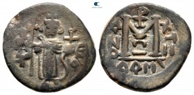 Arab-Byzantine. Dimashq (Damascus). Standing Caliph AH 692-697. Standing imperial figure type. Fals AE