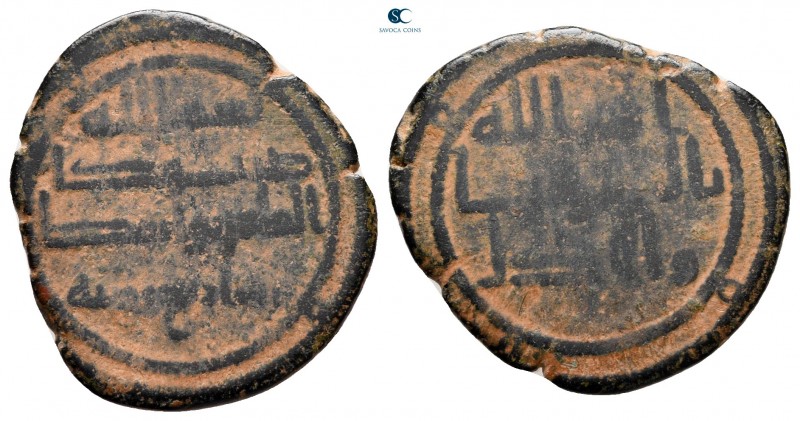 Umayyad Caliphate. Wasit (Iraq) AH 104. 
Fals AE

22 mm, 3,19 g

Legends in...