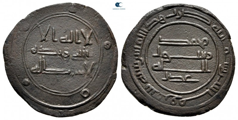 Abbasid Caliphate. No mint AH 202. 
Fals AE

22 mm, 2,41 g

Legend in three...