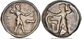 BRUTTIUM. Caulonia. Late 5th century BC. AR stater or nomos (27mm, 7.36 gm, 12h). NGC VF 5/5 - 2/5, smoothing. Ca. 530 BC. KAVΛO, full-length figure o...