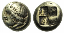 Ionia, Phokaia, c. 478-387 BC. EL Hekte – Sixth Stater (8mm, 2.53g). Wreathed head of Dionysos l.; behind, small seal downward. R/ Quadripartite incus...