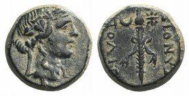 Phrygia, Dionysopolis, c. 1st century BC. Æ (13mm, 3.73g, 12h). Wreathed head of Dionysos r. R/ Filleted thyrsos flanked by crescent and star. von Aul...
