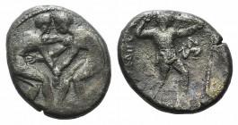 Pamphylia, Aspendos, c. 420-410 BC. AR Stater (20mm, 10.28g, 3h). Two wrestlers grappling. R/ Slinger standing r.; triskeles. Tekin Series 3; SNG BnF ...
