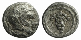 Cilicia, Soloi, c. 410-375 BC. AR Hemiobol or Tetartemorion (5mm, 0.24g, 6h). Helmeted head of Athena r. R/ Grape bunch within linear circle. BMC 24. ...