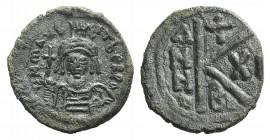 Maurice Tiberius (582-602). Æ 20 Nummi (22mm, 4.93g, 7h). Constantinople, year 11 (592/3). Diademed, helmeted and cuirassed facing bust, holding globu...