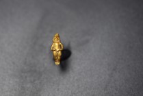 Greek AV earing, 3rd - 1st Cent. BC, formed as a miniature figure of Eros standing nude.