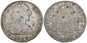 CARLOS III. 8 Reales. (Ar. 26,65g/40mm). 1779. México FF. (Cal-2019-1118). MBC-. Resellos chinos. Acuñación floja.