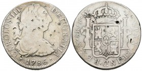CARLOS III (1759-1788). 8 Reales. (Ar. 26,43/39mm). 1786. México. FM. (Cal-2019-1129). BC. Resellos orientales.