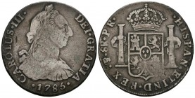 CARLOS III (1759-1788). 8 Reales. (Ar. 26,37g/39mm). 1785. Potosí PR. (Cal-2019-1189). BC+.