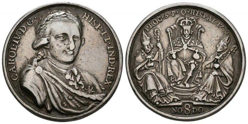 CARLOS IV (1788-1808). Proclamación en Sevilla. (Ar. 23,78g/35mm). 1789. Grabado...