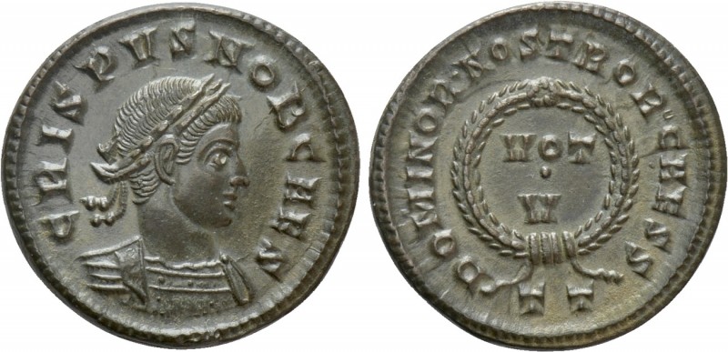 CRISPUS (Caesar, 316-326). Follis. Ticinum. 

Obv: CRISPUS NOB CAES. 
Laureat...