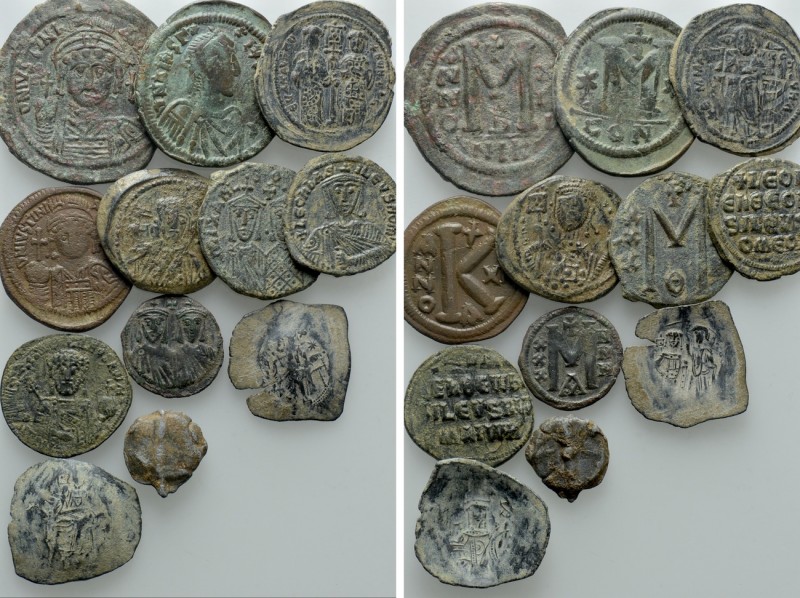 12 Byzantine Coins and Seals. 

Obv: .
Rev: .

. 

Condition: See picture...