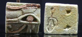 Egypte - Basse époque - Œil Oudjat en fritte - 664 / 332 av. J.-C. (26ème-30ème dynastie)
Œil oudjat en fritte. L'objet est inscrit au dos. 20 mm....
