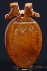 Egypte - Basse époque - Amulette en pierre - 664 / 332 av. J.-C. (26ème-30ème dynastie)
Importante amulette en pierre marron représentant le cœur. 32...