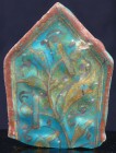 Proche Orient - Iran - Mosaïque - 1200 / 1300 ap. J.-C.
Fragment de mosaïque ou carreau émaillé de couleur vert émeraude, représentant un rameau de f...