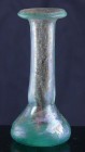 Romain - Empire d'Orient - Fiole en verre lourd - 100 av / 100 ap. J.-C.
Petite fiole en verre épais de couleur bleu turquoise. Col effilé et haut év...