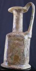 Romain - Carafe en verre irisé - 100 av / 100 ap. J.-C.
Belle carafe en verre irisé de couleur bleu, doré et nacré à anse large et grand col évasé. L...