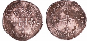 Henri III (1574-1589) - Double sol parisis - 1579 D (Lyon)
A/ HENRICVS III D G FRAN ET P REX. H couronné entre trois lis. 
R/ SIT NOMEN DOMINI BENED...