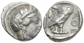 Greek
Attica. Athens circa 454-404 BC. Tetradrachm AR 16.5gr. 24.1mm
Head of Athena right, wearing earring, necklace, and crested Attic helmet decorat...