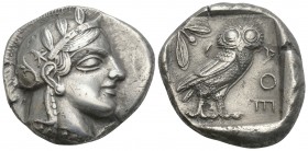 Greek
Attica. Athens circa 454-404 BC. Tetradrachm AR 16.9gr. 26.3mm
Head of Athena right, wearing earring, necklace, and crested Attic helmet decorat...