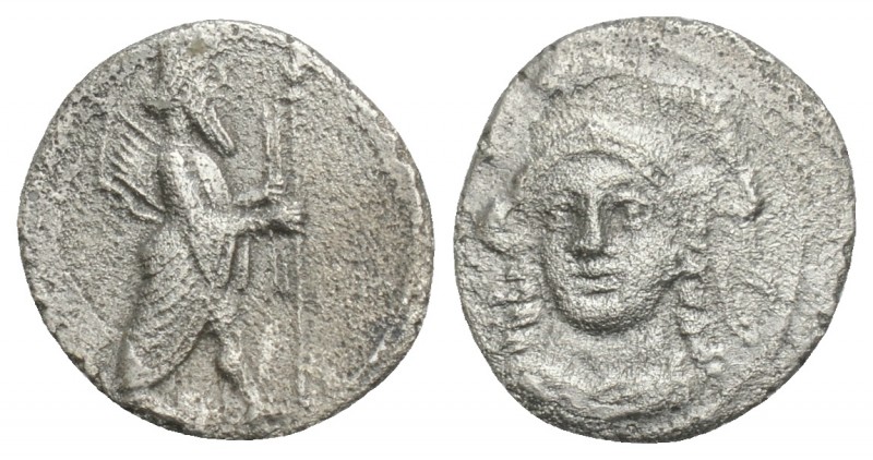 Greek
CILICIA. Uncertain. Obol (4th century BC). 0.7gr. 11.6mm
Obv: Helmeted h...