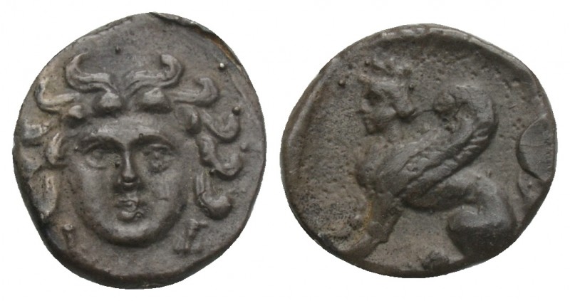 Greek
CILICIA, Uncertain. 4th Century BC. Obol 0.8gr. 10.7mm
Gorgoneion / Sphi...