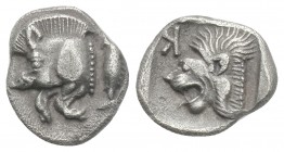 Greek 
MYSIA. Kyzikos. Circa 450-400 BC. Obol 0.8gr. 10.8mm
Forepart of a boar to left; to right, tunny upward. Rev. K Head of a lion to left within i...