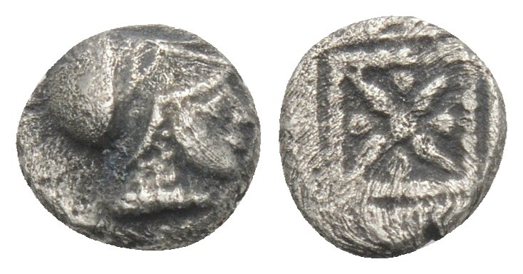 Greek 
Asia Minor. Uncertain mint circa 500-400 BC. Hemiobol AR 0.4gr 6.9mm
Helm...