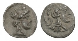 Greek 
CILICIA. Nagidos (?). 4th century BC. 0.15gr 6.4mm
Head of Athena to right, wearing crested Attic helmet. Rev. Turreted head of Aphrodite to le...