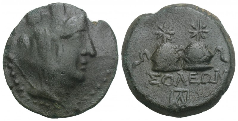 Greek 
Cilicia, Soloi Æ20. Circa 100-30 BC. 6.1gr. 21.1mm
Turreted, veiled, and ...