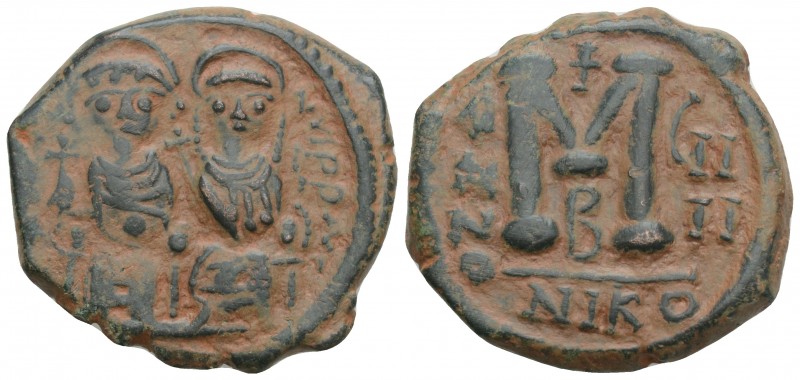 Byzantine
JUSTIN II. 565-578 AD. Æ Follis. Nicomedia mint. Dated RY 8 (572/3 AD)...