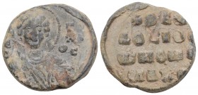 BYZANTINE 
LEAD SEALS. Uncertain (10th-13th centuries). 9.2gr. 21.7mm
Obv: Facing bust of the Virgin Mary, . Rev: Legend in four lines.