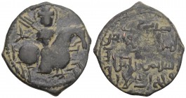 "Seljuqs of Rum Rukn al-din Suleiman ibn Kilij Arslan, 592-600 AH. Bronze Fals, 7.6gr 30.3mm
 Rider galloping to r. with trident. Rev. Five line legen...