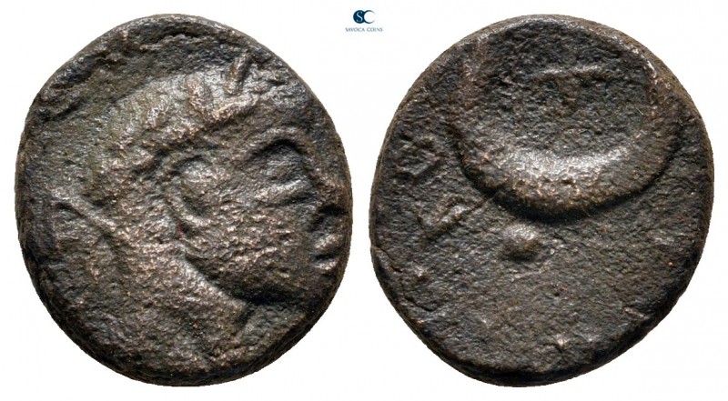 Mesopotamia. Carrhae. Elagabal AD 218-222. 
Bronze Æ

13 mm, 2,17 g



ve...