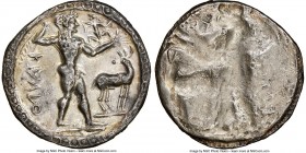 BRUTTIUM. Caulonia. Early 5th century BC. AR stater or nomos (25mm, 6.89 gm, 12h). NGC Choice XF 3/5 - 3/5. Ca. 530 BC. KAVΛO (retrograde), full-lengt...