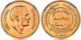 Hussein Ibn Talal gold Pattern 100 Fils AH 1387 (1968) AU58 NGC, KM-Pn6. Mintage: 50. A rare gold Pattern strike of the copper-nickel 100 Fils. Only 5...