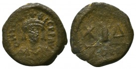 Justinian I. A.D. 527-565. AE 
Condition: Very Fine



Weight: 2.5 gr
Diameter: 17 mm