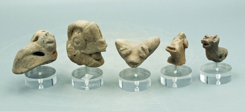 A collection of five Teotihuacan zoomorphic heads from Mexico, ca. 400 - 750 A.D...