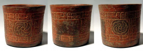 A choice Maya cylinder from the Motagua Valley of Guatemala, ca. 400 - 700 A.D. This elaborately carved orangeware vessel is 5-1/2? high, 6-1/4? in di...