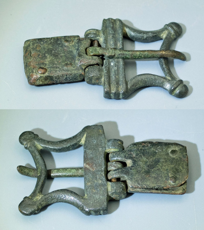 A fine Roman belt buckle, ca. 1st - 3rd Century A.D. This nice bronze example is...