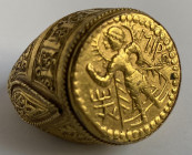 Gold ring with Kushan coin.4th-5th Century A.D. In our estimation the coin is genuine and the ring is either contemporary or Medieval Persian time Ca....