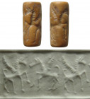 A nice Neo-Assyrian cylinder seal with winged horses, ca. 8th - 7th Century B.C. the scene depicting two well defined winged horses facing one another...