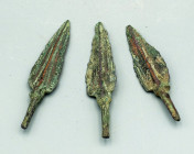 A trio of fine bronze arrowheads, Elamite-Luristan, ca 1100 - 800 B.C. They range from 2-1/2? to 2-3/4? in length, are deltoid form, with pronounced f...