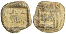 ABBASID: lead seal (11.67g), A-338Y, in the name of 'Abd Allah b. (Bâbûs?), father's name clear but actual reading uncertain, possibly late Umayyad, V...