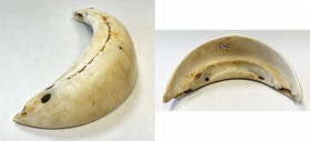 BURUNDI: shell pendant (52.47g), 88mm in diameter, crescent-shaped pendant worn by women at the neck, choice VF, ex Charles Opitz Collection. 
Estima...
