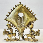 INDONESIA: SUMBA: gilt tin mamuli earring (95.31g), Opitz p. 208 (plate example), ca. 105 x 110mm, hollow diamond-shaped body with key hole-shaped ope...