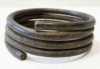 NIGERIA: copper Calabar coils, 80mm, likely made in Nigeria from the Cross River region in the 18-19th Centuries, darkly patinated copper, VF, ex Char...