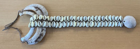 PAPUA NEW GUINEA: boar tusk & shell breast plate, 46cm, Kubkain boar tusks with large scalloped shell and cowry shells, 18" length, these types of 'pe...
